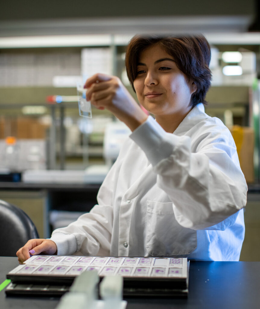 Intern Isabella Montoya in the laboratory